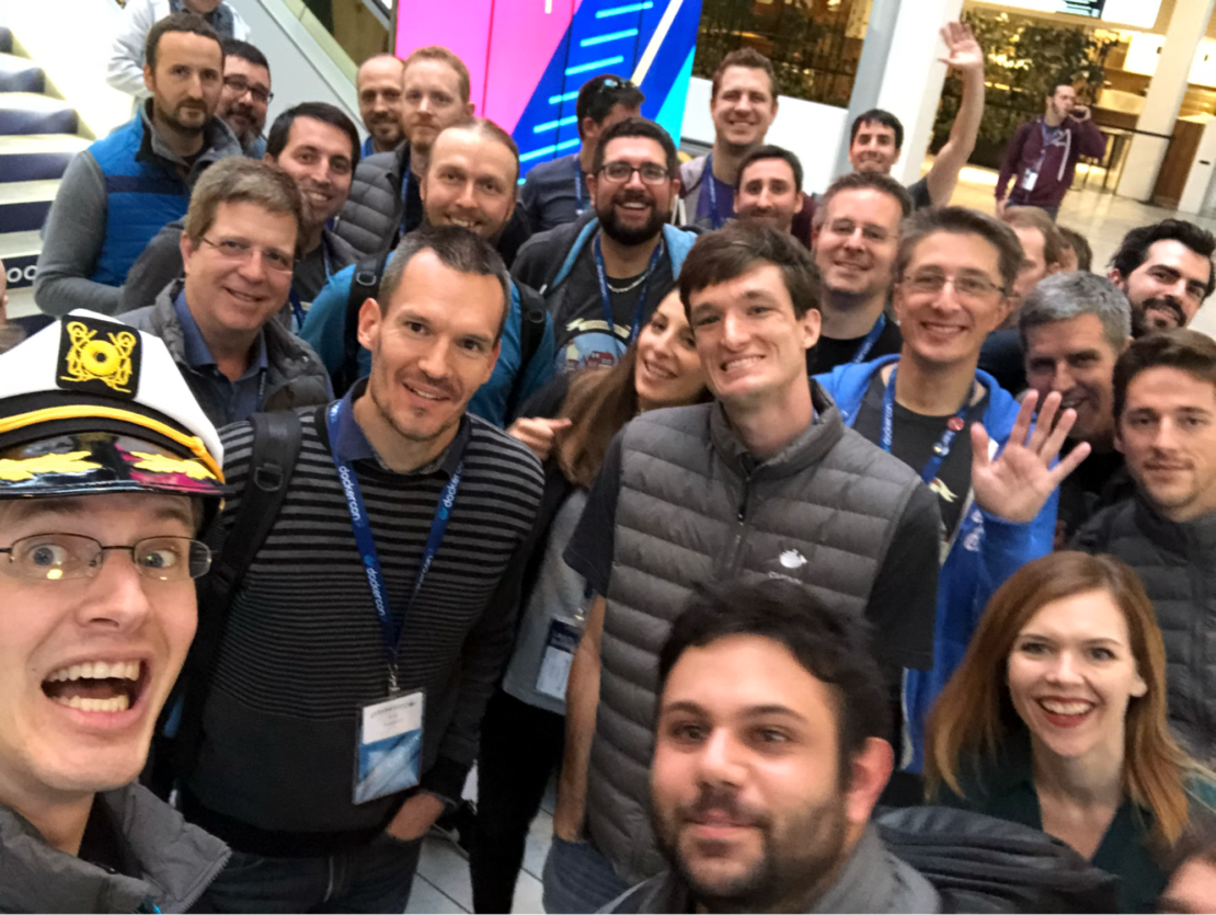 Selfie showing Michael Irwin (wearing nautical hat) with other Docker Captains at DockerCon EU 2017 in Copenhagen.